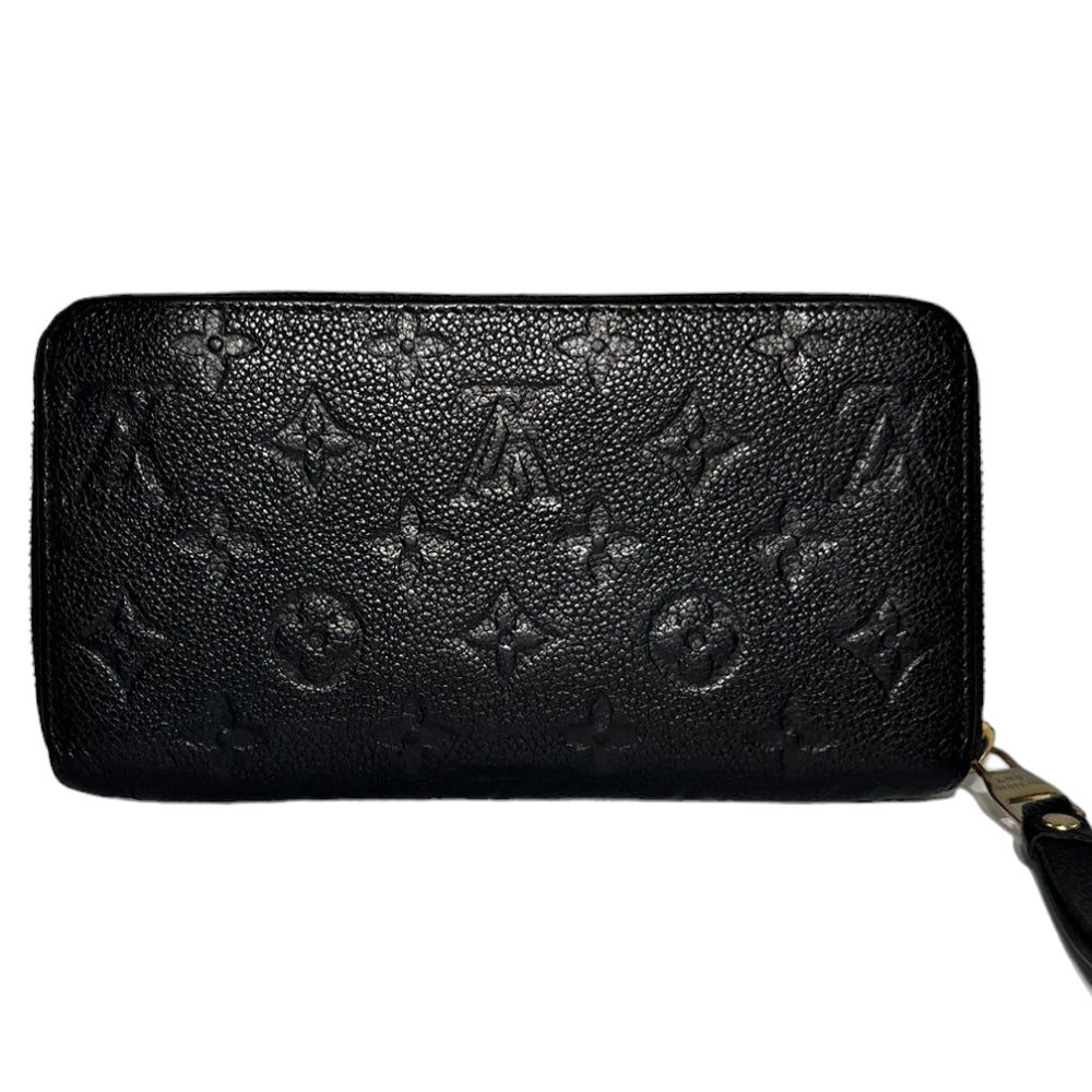 LOUIS VUITTON Porte-monnaie en cuir noir Monogram Empreinte LHQ130